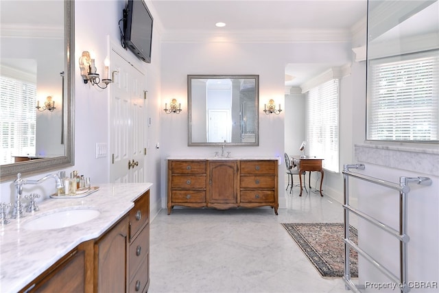 1921 Miln House Rd, Williamsburg, VA 23185 - bathroom featuring two vanities, ornamental molding, and baseboards