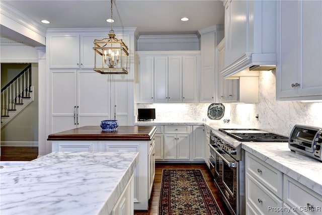 1921 Miln House Rd, Williamsburg, VA 23185 - kitchen featuring range with two ovens, custom range hood, wooden counters, white cabinets, and dark wood-style flooring