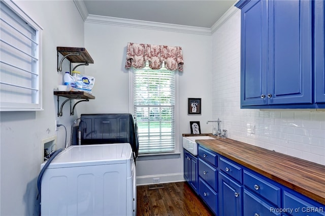 1921 Miln House Rd, Williamsburg, VA 23185 - washroom featuring washer / clothes dryer, cabinet space, dark wood-style flooring, crown molding, and baseboards