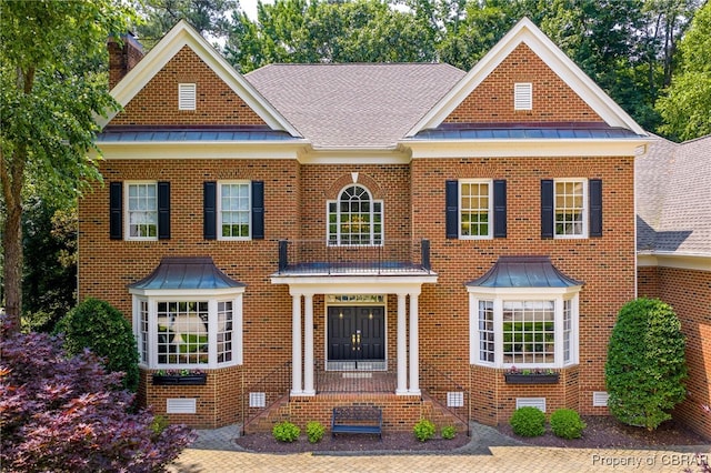 1921 Miln House Rd, Williamsburg, VA 23185 - colonial inspired home featuring a standing seam roof and metal roof