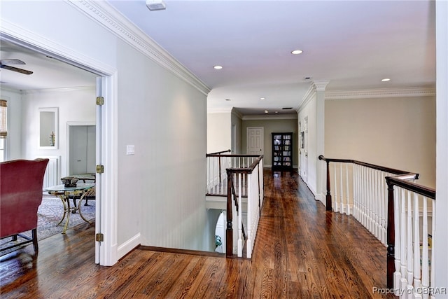 1921 Miln House Rd, Williamsburg, VA 23185 - hall featuring an upstairs landing, wood finished floors, recessed lighting, baseboards, and ornamental molding