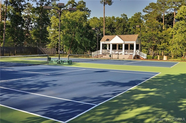 1921 Miln House Rd, Williamsburg, VA 23185 - view of tennis court featuring view of scattered trees