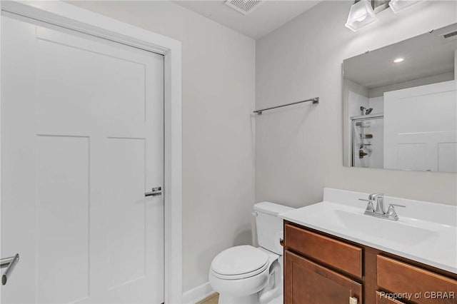 202 Arbordale Loop, Williamsburg, VA 23188 - full bathroom with vanity, toilet, a shower, and baseboards