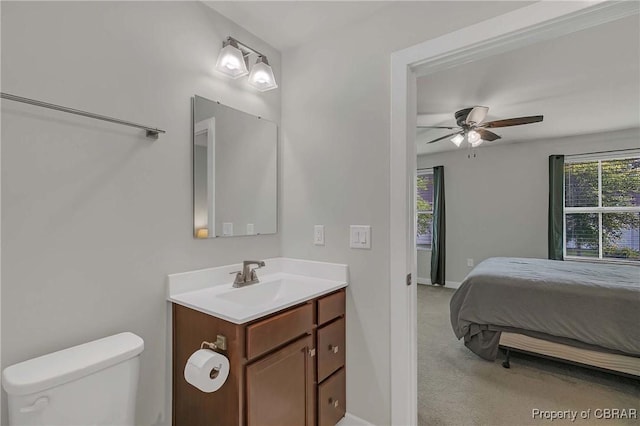 202 Arbordale Loop, Williamsburg, VA 23188 - bathroom featuring vanity, toilet, a ceiling fan, baseboards, and ensuite bathroom