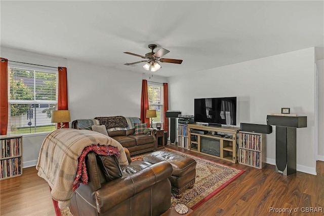 202 Arbordale Loop, Williamsburg, VA 23188 - living area featuring ceiling fan, plenty of natural light, wood finished floors, and baseboards