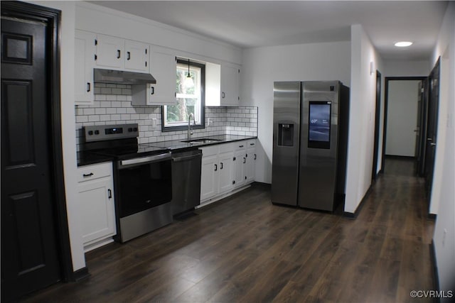 4201 Kempwood Pl, Chesterfield, VA 23832 - kitchen featuring stainless steel appliances, under cabinet range hood, dark countertops, and a sink