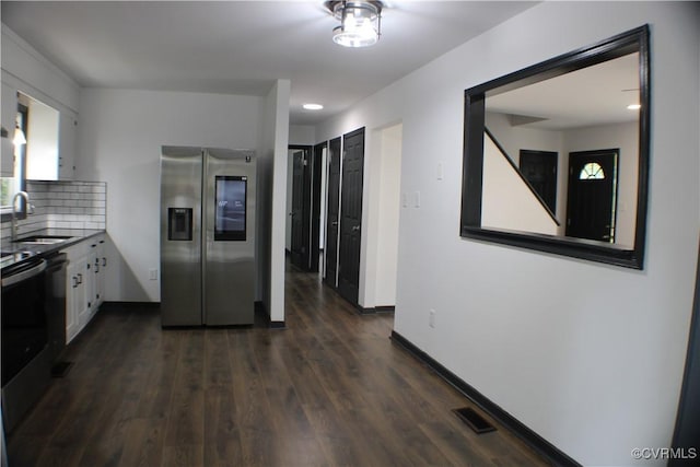 4201 Kempwood Pl, Chesterfield, VA 23832 - kitchen featuring stainless steel refrigerator with ice dispenser, a sink, white cabinets, tasteful backsplash, and dark wood finished floors