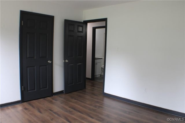 4201 Kempwood Pl, Chesterfield, VA 23832 - unfurnished bedroom with dark wood-type flooring and baseboards