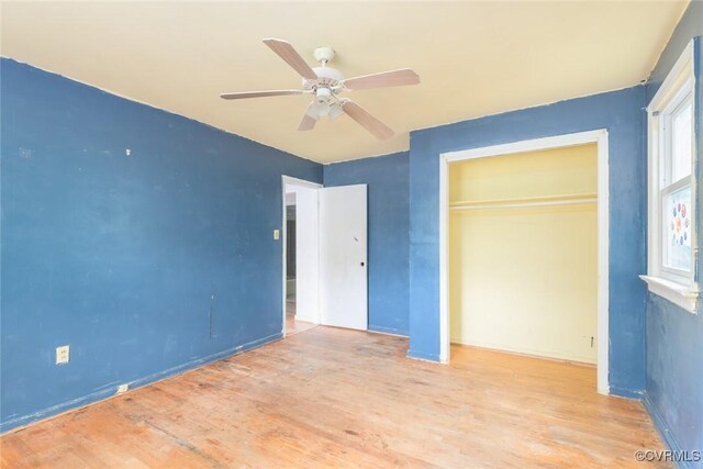 8005 Three Chopt Rd, Henrico, VA 23229 - unfurnished bedroom featuring wood finished floors, a closet, a ceiling fan, and baseboards