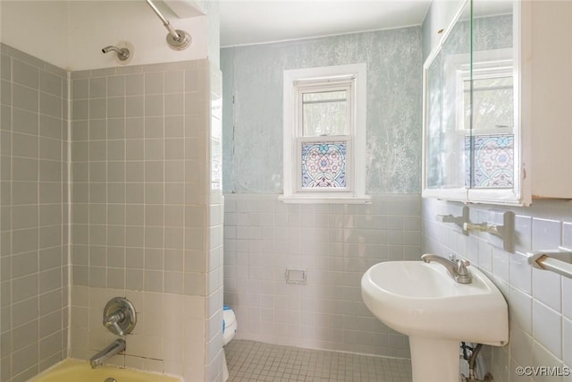 8005 Three Chopt Rd, Henrico, VA 23229 - full bath with tile walls, shower / tub combination, toilet, tile patterned floors, and wainscoting