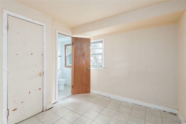 8005 Three Chopt Rd, Henrico, VA 23229 - unfurnished bedroom featuring light tile patterned flooring and baseboards