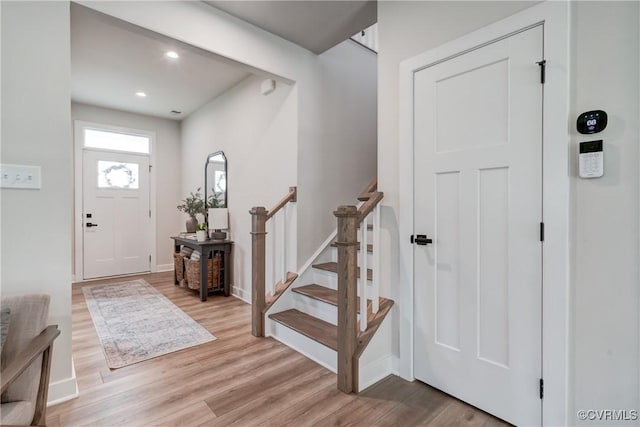 18342 Magnolia Run Ln, Moseley, VA 23120 - entryway featuring light wood-type flooring, stairway, and recessed lighting
