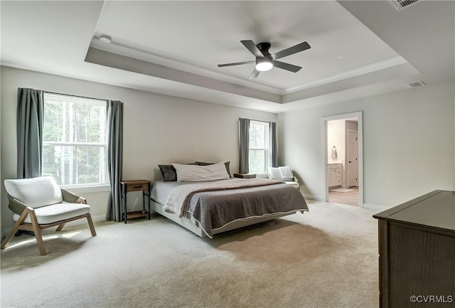 18342 Magnolia Run Ln, Moseley, VA 23120 - bedroom with a raised ceiling, light colored carpet, ensuite bathroom, and ceiling fan