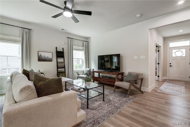18342 Magnolia Run Ln, Moseley, VA 23120 - living room with light wood finished floors, ceiling fan, and recessed lighting
