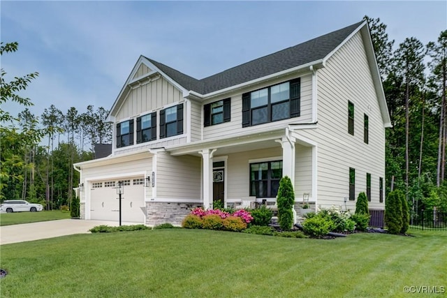 18342 Magnolia Run Ln, Moseley, VA 23120 - craftsman house featuring an attached garage, covered porch, a front lawn, and driveway
