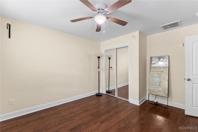 3104 1st Ave, Richmond, VA 23222 - unfurnished bedroom with wood finished floors, baseboards, a closet, and a ceiling fan