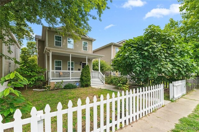 3104 1st Ave, Richmond, VA 23222 - view of front of house featuring a porch and a fenced front yard
