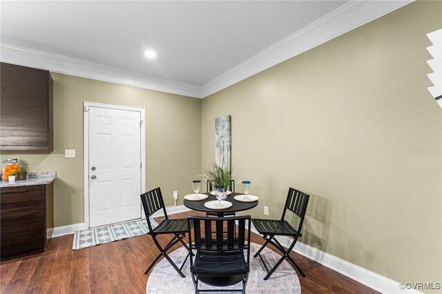 3104 1st Ave, Richmond, VA 23222 - dining room with crown molding, dark wood-type flooring, and baseboards