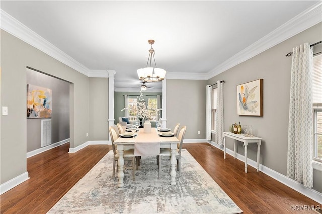 3104 1st Ave, Richmond, VA 23222 - dining area with a chandelier, crown molding, dark wood-style floors, and baseboards