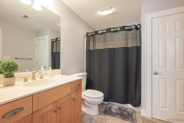 3316 Hillcrest Trl, Toano, VA 23168 - full bath with vanity, toilet, curtained shower, and tile patterned floors