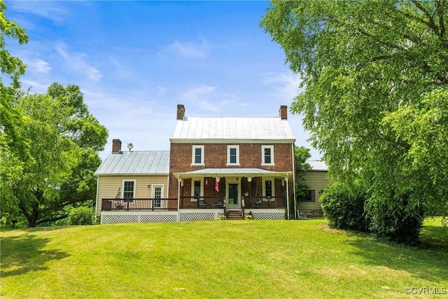 504 Springbranch Rd, Lexington, VA 24450 - rear view of property featuring a chimney, a yard, a standing seam roof, a porch, and metal roof