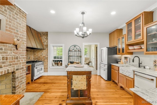 504 Springbranch Rd, Lexington, VA 24450 - kitchen with stainless steel appliances, custom exhaust hood, light wood-style flooring, a chandelier, and recessed lighting