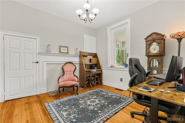 504 Springbranch Rd, Lexington, VA 24450 - home office with a chandelier, wood finished floors, and baseboards