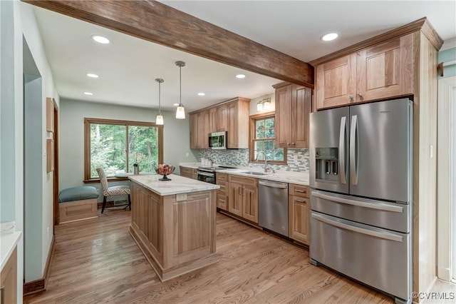 15368 W Fork Dr, Glen Allen, VA 23059 - kitchen featuring stainless steel appliances, a kitchen island, tasteful backsplash, light wood finished floors, and beamed ceiling