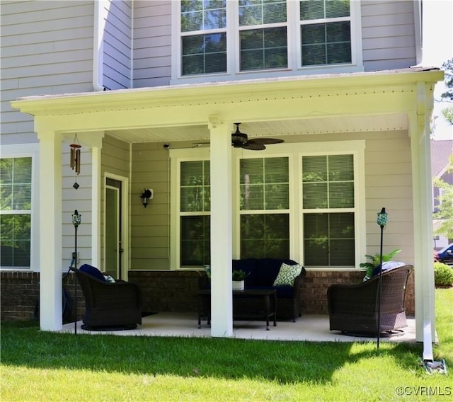 6948 Desert Candle Dr, Moseley, VA 23120 - entrance to property with an outdoor living space, ceiling fan, and a yard