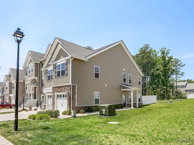3216 Gannet Ln, Midlothian, VA 23112 - view of property exterior with concrete driveway, a garage, a lawn, and a residential view