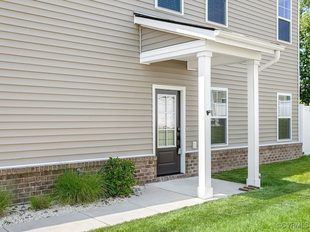 3216 Gannet Ln, Midlothian, VA 23112 - doorway to property with a lawn