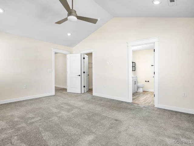 3216 Gannet Ln, Midlothian, VA 23112 - unfurnished bedroom featuring carpet floors, recessed lighting, a spacious closet, connected bathroom, and high vaulted ceiling