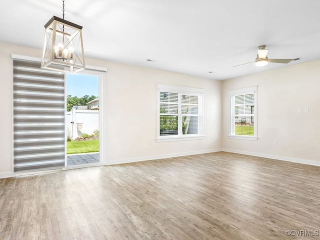 3216 Gannet Ln, Midlothian, VA 23112 - unfurnished room featuring a chandelier, wood finished floors, and a ceiling fan
