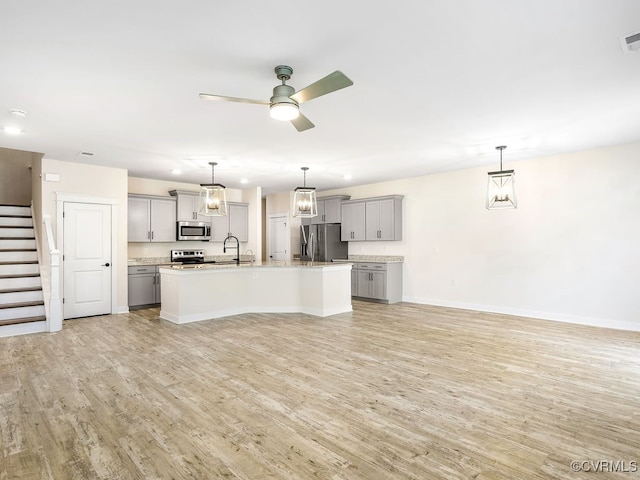 3216 Gannet Ln, Midlothian, VA 23112 - kitchen featuring gray cabinetry, appliances with stainless steel finishes, light wood-style flooring, a ceiling fan, and recessed lighting