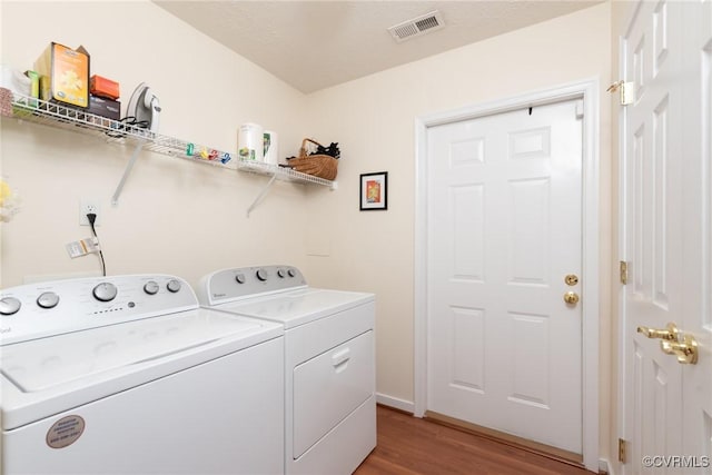 7314 Norwood Pond Pl, Chesterfield, VA 23112 - washroom with washing machine and clothes dryer and light wood-style flooring