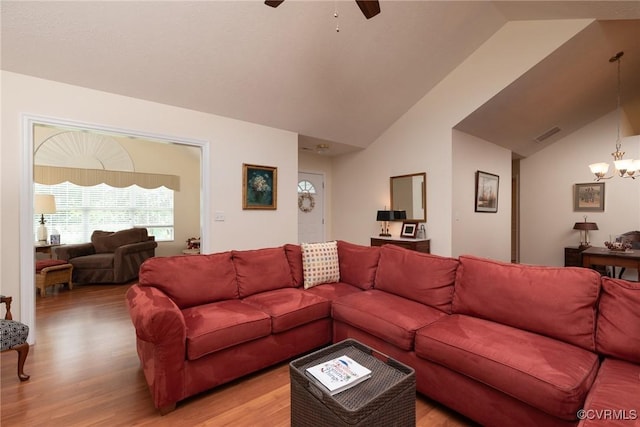 7314 Norwood Pond Pl, Chesterfield, VA 23112 - living area with light wood finished floors, lofted ceiling, a chandelier, and ceiling fan