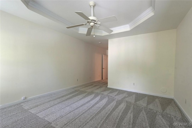 10504 Bishops Gate Dr, Glen Allen, VA 23059 - spare room with a raised ceiling, crown molding, carpet flooring, a ceiling fan, and baseboards