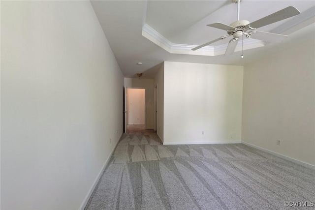 10504 Bishops Gate Dr, Glen Allen, VA 23059 - empty room featuring light carpet, ornamental molding, ceiling fan, baseboards, and a tray ceiling