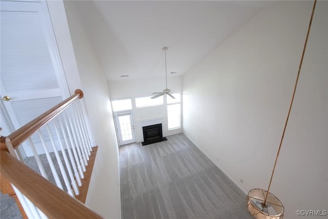 10504 Bishops Gate Dr, Glen Allen, VA 23059 - unfurnished living room featuring carpet floors, a fireplace with flush hearth, ceiling fan, and vaulted ceiling