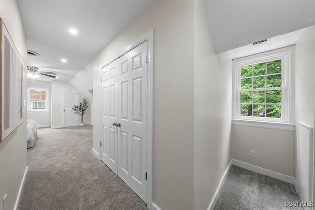 1004 W 45th St, Richmond, VA 23225 - hallway featuring lofted ceiling, carpet, baseboards, plenty of natural light, and recessed lighting