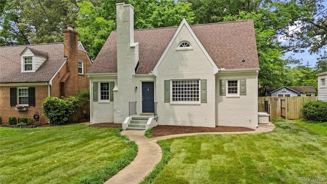 1004 W 45th St, Richmond, VA 23225 - view of front of property featuring brick siding and a chimney