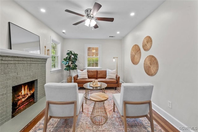1004 W 45th St, Richmond, VA 23225 - living area featuring a fireplace, ceiling fan, baseboards, wood finished floors, and recessed lighting