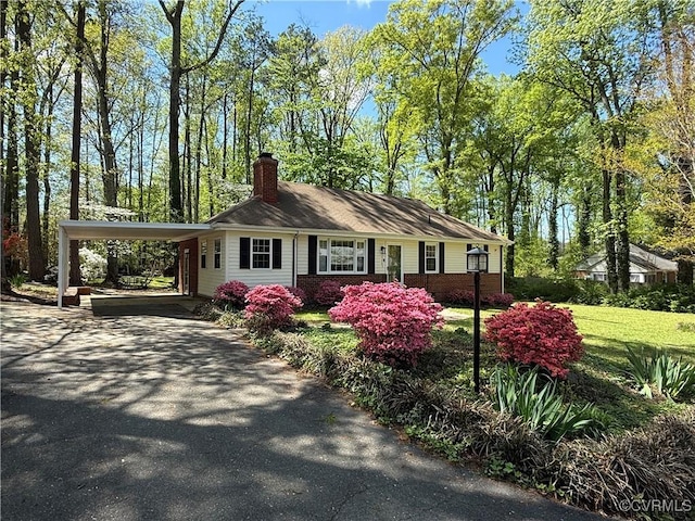 6405 Hagueman Dr, Richmond, VA 23225 - view of front of property featuring a chimney, driveway, and a carport