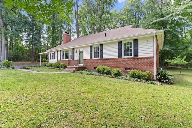 6405 Hagueman Dr, Richmond, VA 23225 - single story home featuring brick siding, a chimney, a front lawn, and crawl space