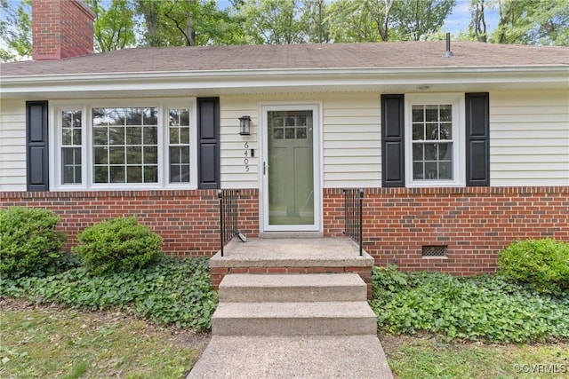 6405 Hagueman Dr, Richmond, VA 23225 - doorway to property with brick siding, a chimney, roof with shingles, and crawl space