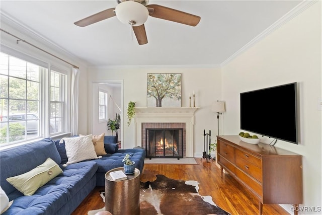 6405 Hagueman Dr, Richmond, VA 23225 - living room with crown molding, wood finished floors, a brick fireplace, and a ceiling fan