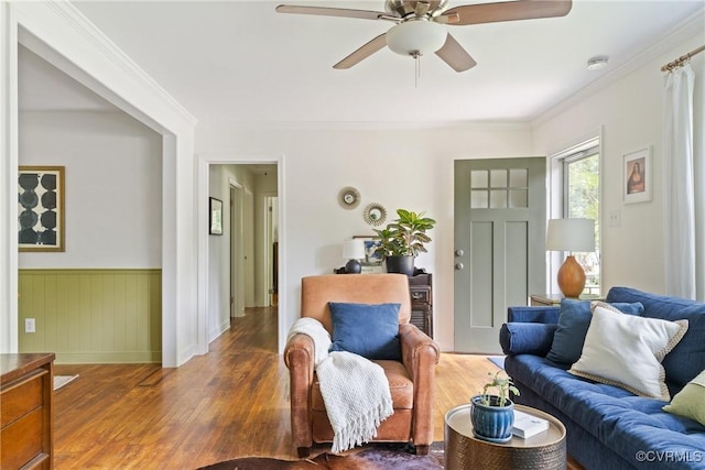 6405 Hagueman Dr, Richmond, VA 23225 - living room featuring wood finished floors, ceiling fan, wainscoting, and crown molding
