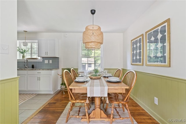 6405 Hagueman Dr, Richmond, VA 23225 - dining area featuring a wainscoted wall and light wood finished floors