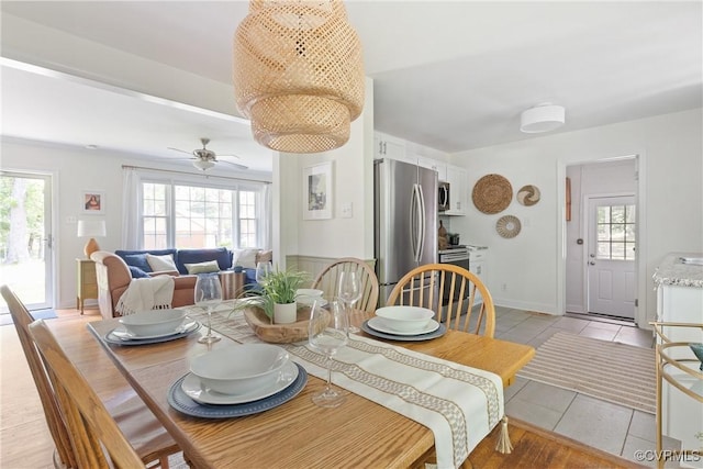 6405 Hagueman Dr, Richmond, VA 23225 - dining area with healthy amount of natural light, a ceiling fan, and light tile patterned floors