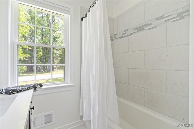 6405 Hagueman Dr, Richmond, VA 23225 - full bathroom with shower / bath combo with shower curtain, baseboards, and vanity